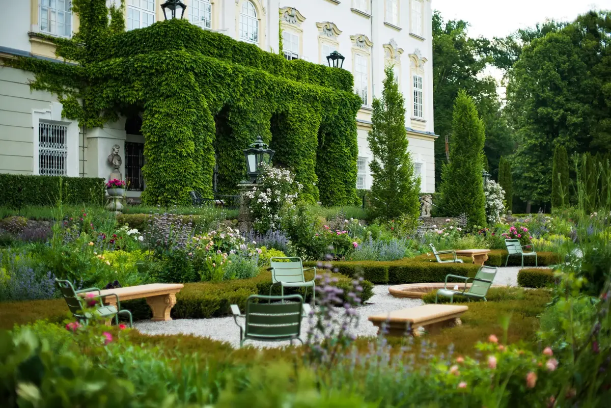 Romantic castle garden section with dense atmospheric planting.