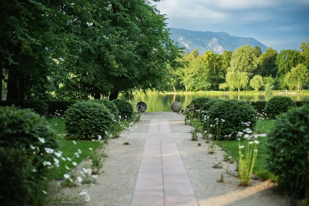 Castle garden with differentiated perennial planting and classical order.