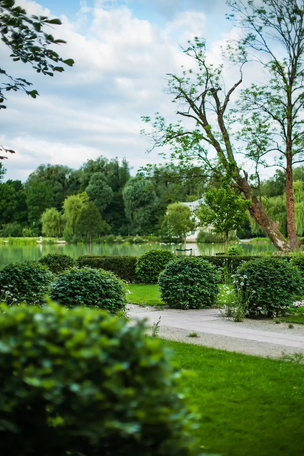 Castle garden with differentiated perennial planting and classical order.